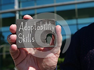 Adaptability Skills is shown on the conceptual business photo