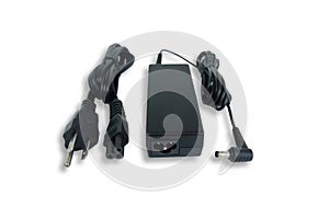 Adapter ac/dc power charger with wire of laptop computer isolated on white