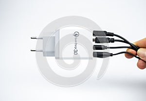 Adapter charger with multiport USB ports isolated on white background