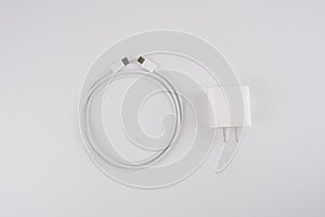 Adapter Charger with usb cable on white background.