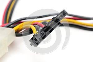 Adapter and plug for connecting SATA drives to the power supply on a white background