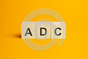 ADC, questions and answers on wooden cubes. Concept photo