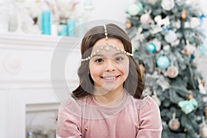 Add some glitz and glam to your look. Happy girl smile with Christmas look. New year eve party look of small child. Give