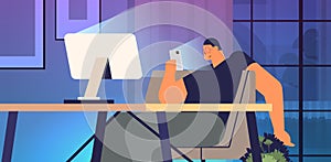 addicted man using digital gadget guy active in social networks at workplace digital addiction concept