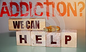 Addiction We can help. Words on wooden blocks. Medical and healthcare concept