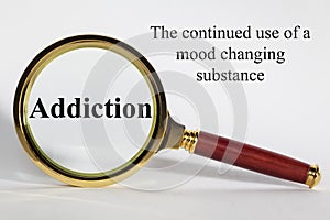 Addiction Concept with Magnifier