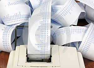 Adding Machine and Long Roll of Paper