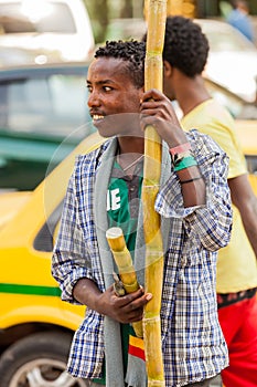 Man selling sugarcane on the street