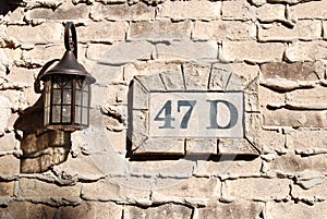 Address on Weeping Mortar Brick Wall