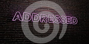 ADDRESSED -Realistic Neon Sign on Brick Wall background - 3D rendered royalty free stock image