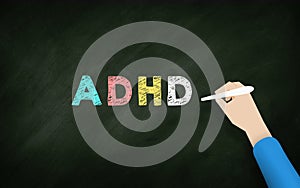 ADHD Hand writing In Chalk background. is one of the most common neurodevelopmental disorders of childhood