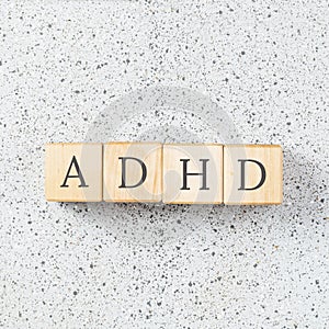 ADHD text on grey background