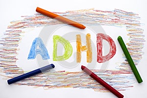 ADHD written on sheet of paper