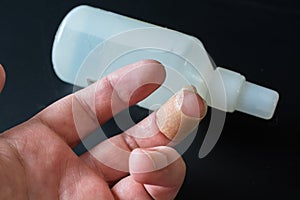 Adhesive Bandage on Men`s Finger.