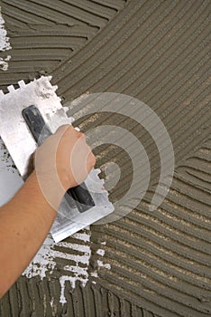 Adhesive for faience