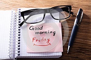 Adhesive Note With Good Morning Friday Text On Notepad