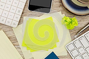 Adhesive note on messy desk