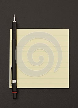 Adhesive note and pen