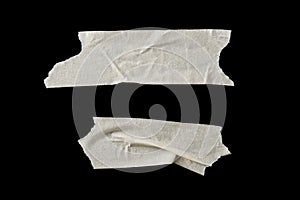adhesive paper , masking tape isolated on black background