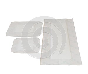 Adhesive wound dressings