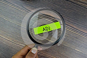 ADI write on sticky notes  on Wooden Table