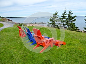 Adirondack chairs overlooking the sea on Prince Edward Island