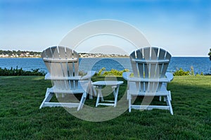 Adirondack chairs overlooking ocean in Newport