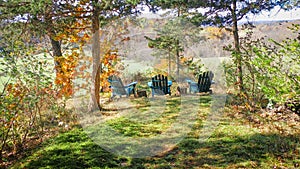 Adirondack Chairs on Scenic Overlook in Fall