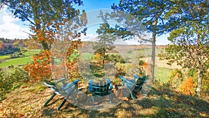 Adirondack Chairs on Scenic Overlook in Fall