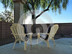 adirondak chairs in Arizona backyard