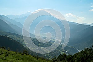 Adishi - A panoramic view on Zhabeshi, a mountain village, located on the bank of the river Mulkhura in Georgia. High Caucasus photo