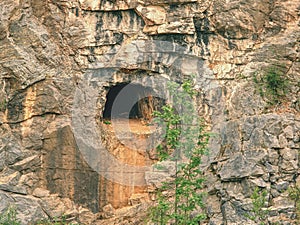 Adit in old abandoned limestone quarry Velka Amerika