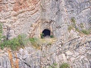 Adit in old abandoned limestone quarry Velka Amerika photo