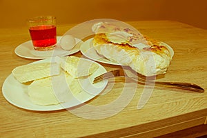 Adjarian khachapuri close-up. This traditional georgian dish con