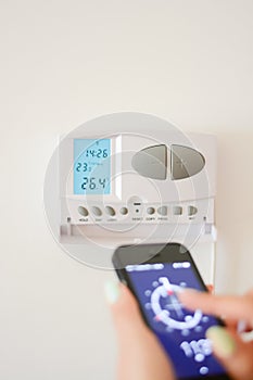 Adjust temperature in home interior with smartphone