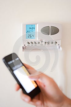 Adjust temperature in home interior with smartphone