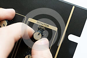 the adjust the volume control knob of the sound music speakers