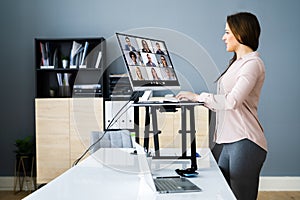 Adjustable Height Desk Stand In Office