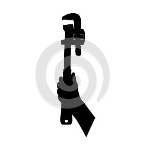 Adjustable plumber wrench, pipe wrench in hand, icon tool, black silhouette isolated on white background. Flat design. Instrument