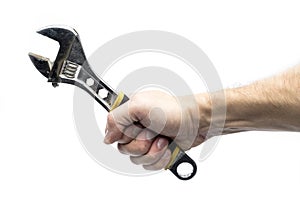 Adjustable spanner in hand on a white background