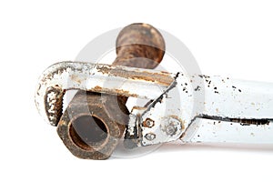 Adjustable spanner and rusty bolt with a nut