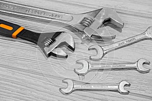 Adjustable spanners and wrenches on the table