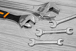 Adjustable spanners and wrenches on the table