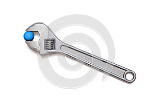 Adjustable wrench with blue ball, isolated on white background