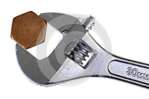 Adjustable wrench and hexagonal cap photo