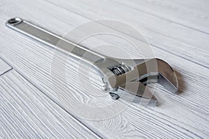 Adjustable wrench on the table close up
