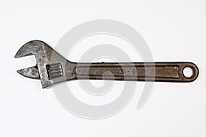 Adjustable wrench on white background