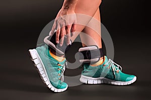 Adjusting ankle weights photo