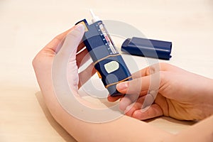 Adjusting dose of insulin photo