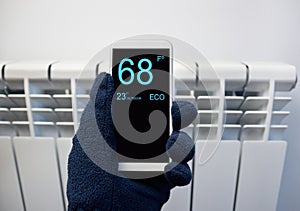 Adjusting temperature on thermostat with smartphone